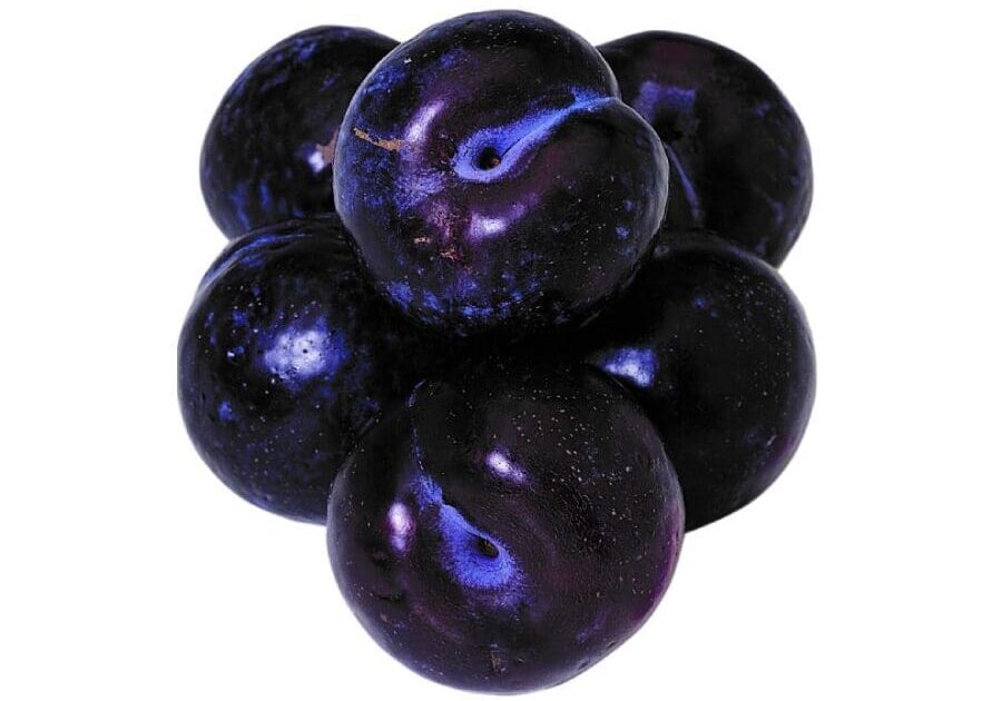 A group of plums that are sitting in the air.