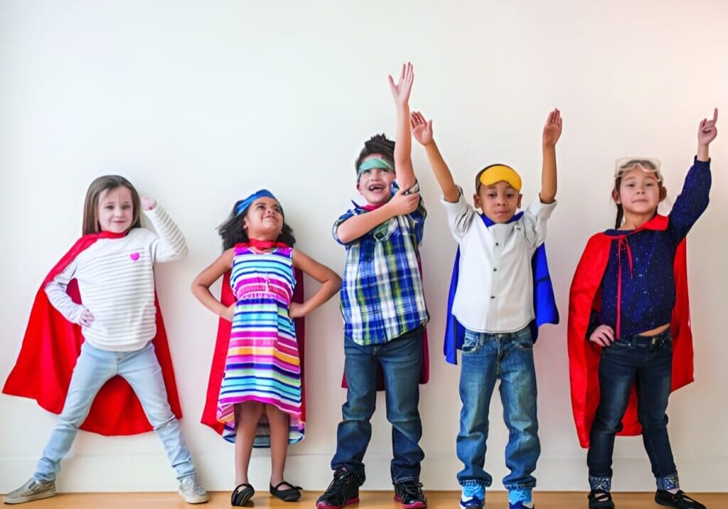 A group of kids dressed up like superheroes.