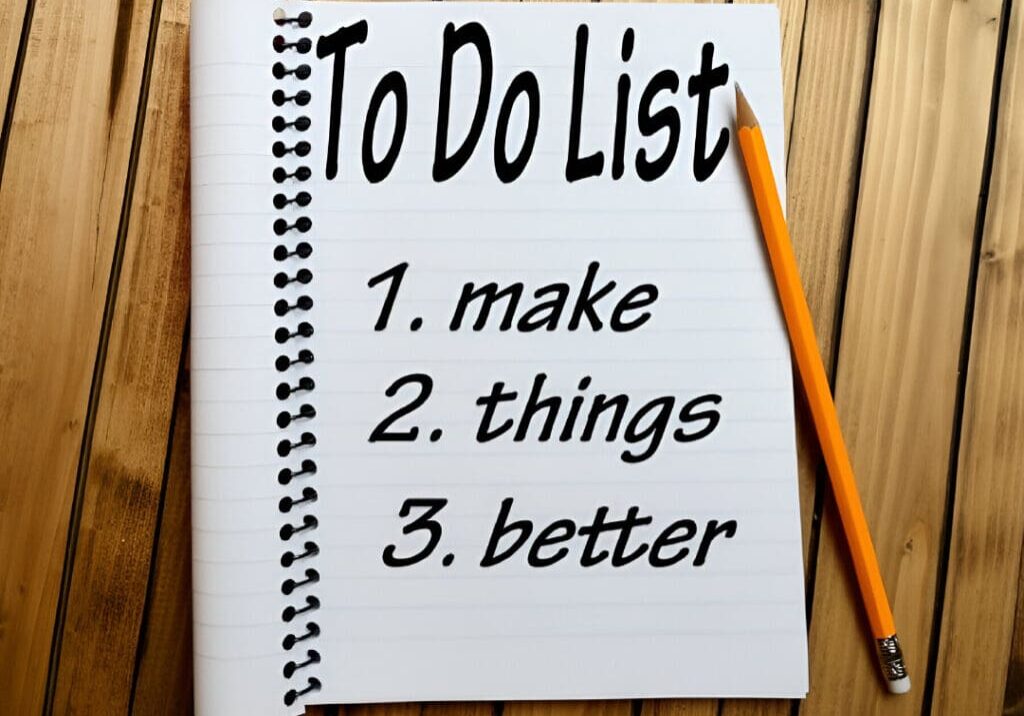 A to do list with the words make, things and better written on it.