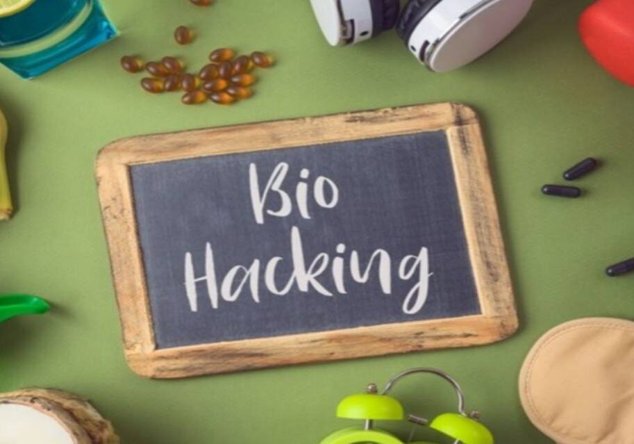 A chalkboard with the words bio hacking written on it.