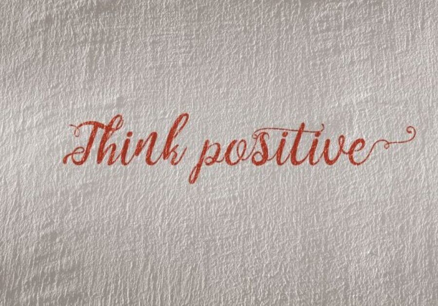 A towel that says " think positive ".